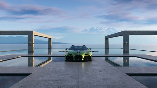 Зеленый спортивный автомобиль Bugatti Brouillard стоит на бетонной платформе, на фоне обширного водоема и заснеженных гор
